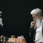 Mindful Technology - Elderly Man Thinking while Looking at a Chessboard