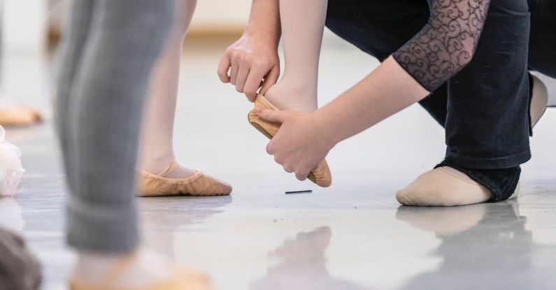 Training Empathy - Close up of Ballerina Wearing Pointe Shoes