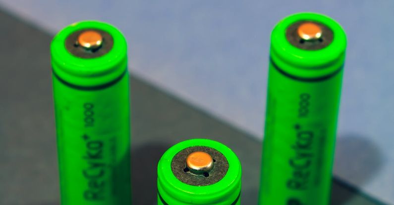 Green Technologies - Green Plastic Tube on Gray Surface