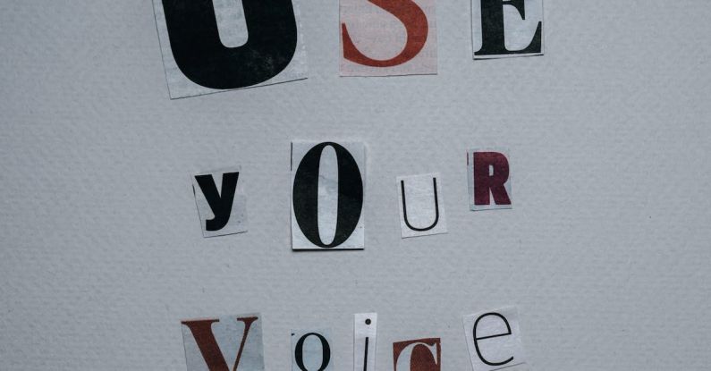 Creative Campaign - Use Your Voice inscription on gray background