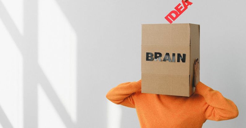 Pivot Purpose - Box with Brain inscription on head of anonymous woman
